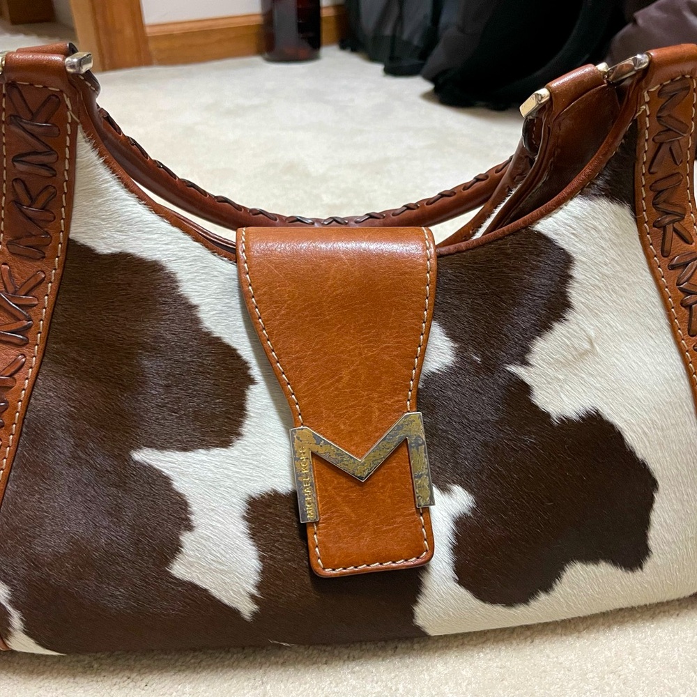 Michael Kors cow print leather gently used